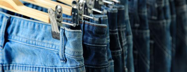 Retail pairs of jeans on a rail