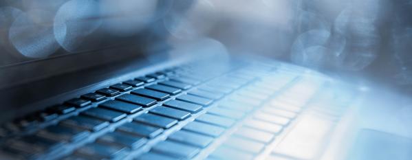 Lateral view of a notebook with backlight