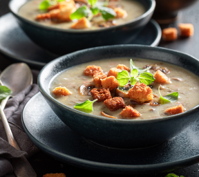 Close up image of soup in bowls